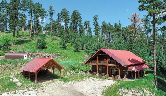 Spacious cabin off Hwy 85 with beautiful views and plenty of trailer parking.
