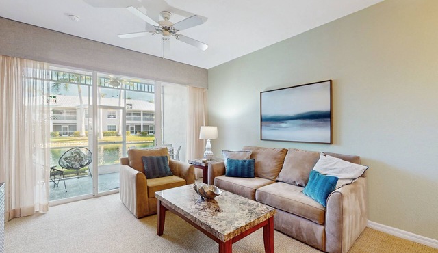 Water view condo w/access to community amenities, wifi, & outdoor private patio
