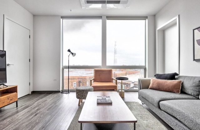 Luxe Logan Square 2BR w/Gym, Roof Deck, 1 block to L, by Blueground (ID #CHI371)