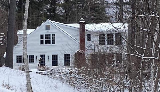 Picturesque creekside home with gorgeous deck & sunroom, near 4 ski mountains